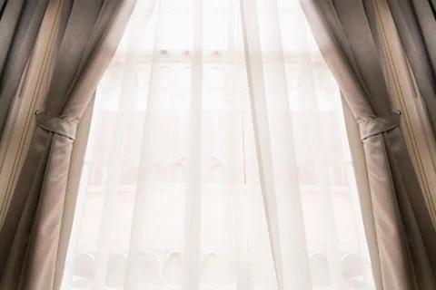 Curtain on window Stock Photos