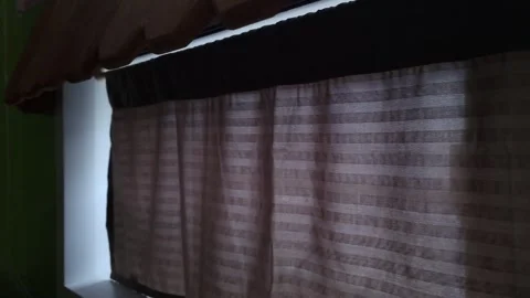 Curtains on kitchen window(fast) Stock Footage 256739376