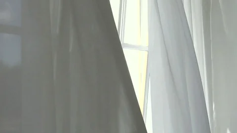 Curtains transparent to the world through the window. Stock Footage 81346827