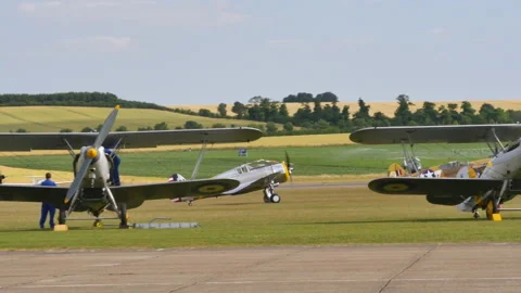 Curtiss P-40 Warhawk takes off with P-36 Hawk WW2 fighter airplanes Video stock 155458770