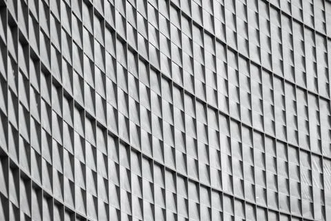 Curve glass windows square pattern modern contemporary architecture buildin.. Stock Photos