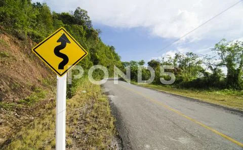 The curve road and blue sky Stock Photos