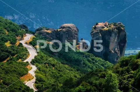 Curve road to Holy Trinity Monastery, Meteora, Greece Stock Photos