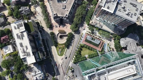 Curved apartment complex and rooftop pool in Uptown Dallas aerial drone view Stock Footage 342479436