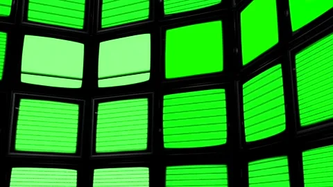 A Curved Array of Screens Displaying Green Screen Static in the Dark. Chroma Key Stock Footage 267706268