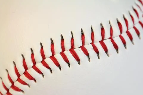 Curved baseball threads macro Stock Photos