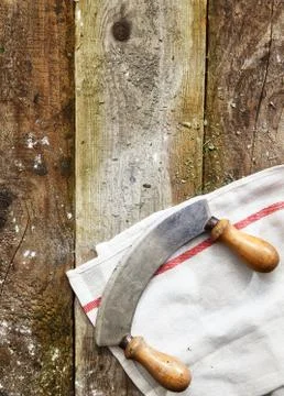 Curved double handled knife Stock Photos