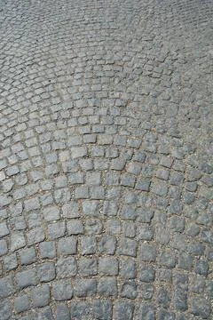 Curved Fan Pattern Cobblestone Pavement Surface Foto stock
