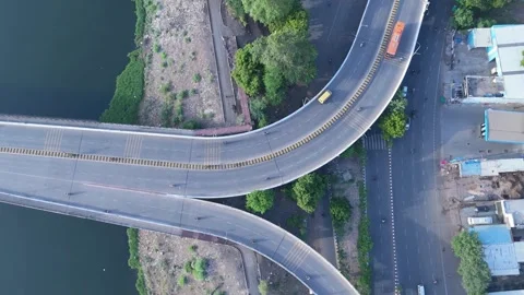 Curved Highway Flyover Interchange with Moving Vehicles Aerial Drone Top Vie Stock-Footage 337959478