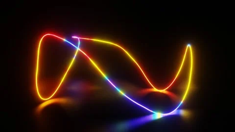 A curved line glows in different colors and rotates on a dark background. loopin Stock Footage 258273486