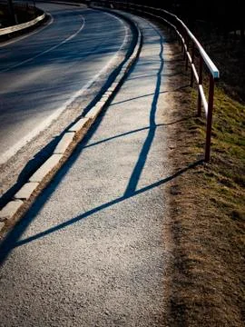 Curved path with sidewalk next Stock Photos