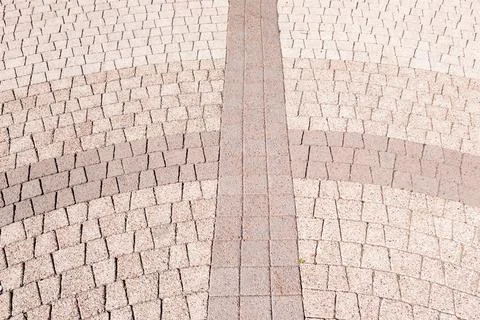 Curved pattern of stone pavement texture Stock Photos