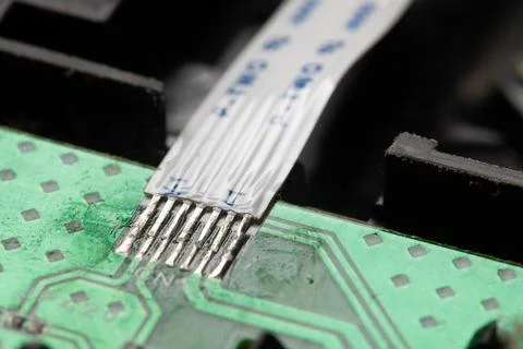 Curved PCB FPC part, flexible contact. Electronics and microchips Stock Photos