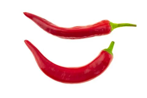 Curved pod of peppers parallel vegetable on a white basis culinary design men Stock Photos