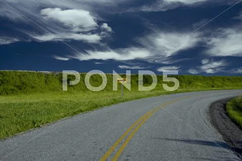 Curved road Stock Photos
