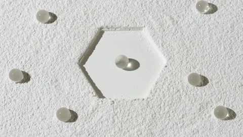 Curved shot of sifted powder layer with hydrogel spheres Stock Footage 342563042