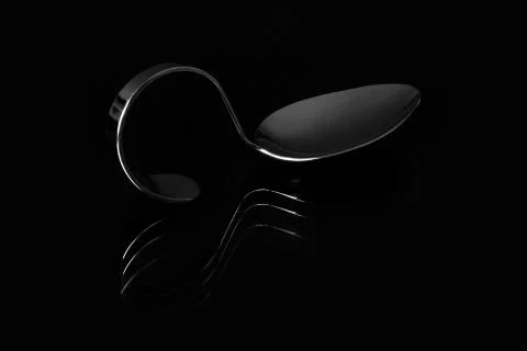 Curved spoon Stock Photos