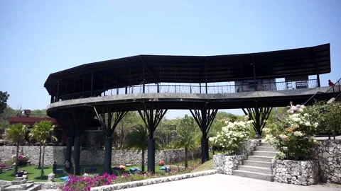 Curved viewing deck architecture and garden stone stairs at Obelix Sea View 動画素材 346683836