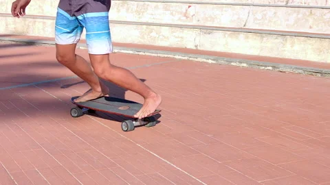 Curves a speed with the longboard Stock Footage 136106775