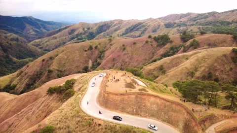 Curving Highway Through Rolling Mountain Hills in the Philippines Stock Footage 337783941