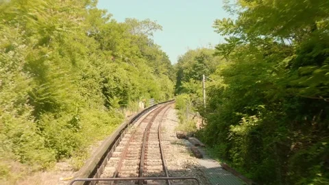 Curving Sassi Superga Tramway Tracks Surrounded by Greenery in Turin, Italy Stock Footage 342321670