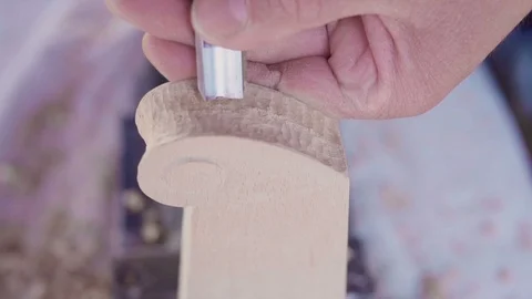 Curving wood for instrument in slow motion Stock Footage
