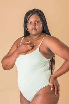 Curvy plus size model. overweight body acceptance confidence. Latin Cuban body Stock Photos