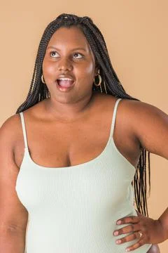 Curvy plus size model. overweight body acceptance confidence. Latin Cuban body Stock Photos