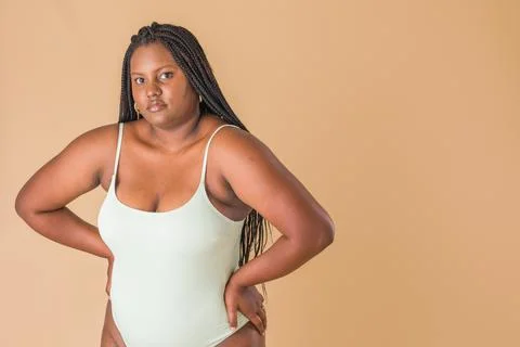 Curvy plus size model. overweight body acceptance confidence. Latin Cuban body Stock Photos