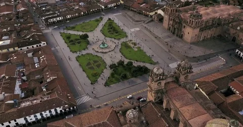 Cusco Peru Aerial v12 Flying low over main plaza panning down Stock Footage