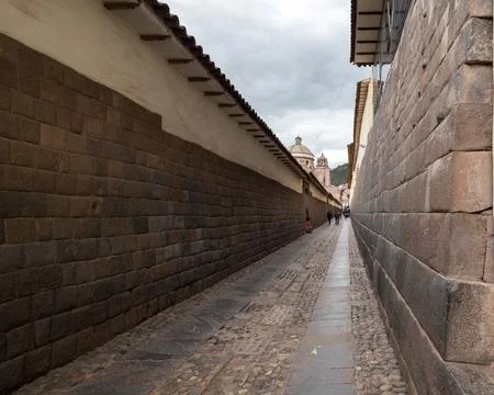 Cusco, Provincia de Cusco, Peru - October 16, 2018: Cusco's Ancient Walls Amid Stock Photos