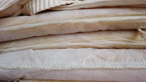 Cushions for sofas placed one on top of the other Stock Footage 161944144