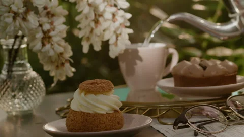 Custard cake with cream with tea Stock Footage 233778214