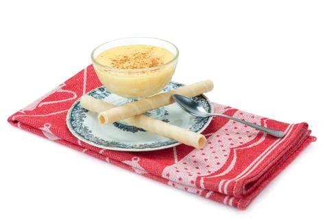 Custard over a white background Stock Photos