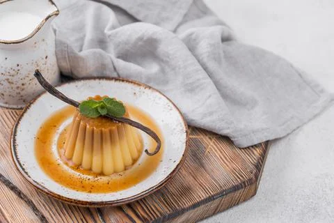 Custard plate with mint vanilla pod. High quality photo Stock Photos