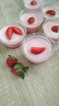 Custard strawberries Stock Photos