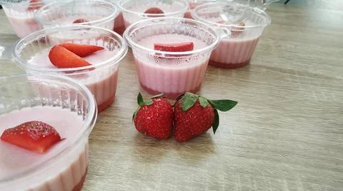 Custard strawberries Stock Photos