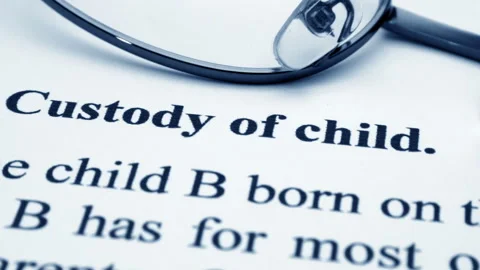 Custody of child document dolly shot Vídeo Stock 300302998