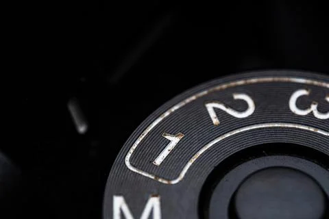 The custom 1 adjustment dial is close on the camera. Old and dirty Stock-Fotos