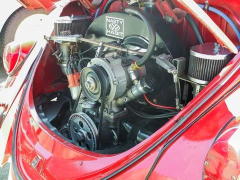 Custom air-cooled engine of a red Volkswagen Beetle at a car show in Ruston.. Stock Photos