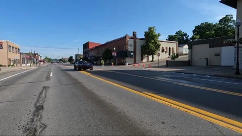 Custom C3 Chevrolet Corvette with Side Exhaust Arriving at Classic Car Show Stock Footage 348449486