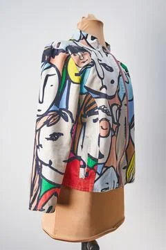 Custom designed white jacket. Multicolor spring dress Stock Photos