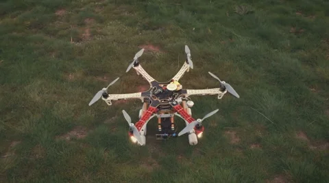 Custom drone hexacopter takes off from the field Video stock 63452338