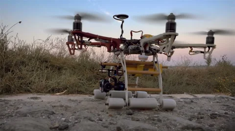 Custom drone hexacopter takes off from the field. Slow motion. Video stock 67498227