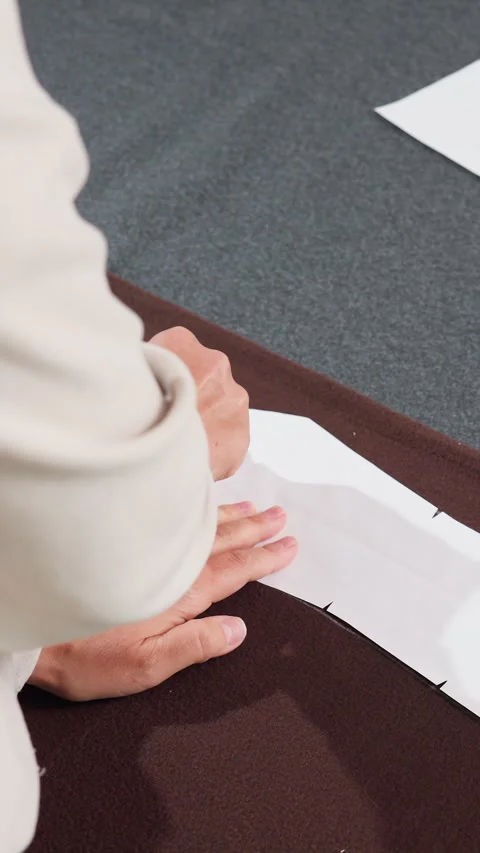 Custom fabric setup, Fabric design and cutting process, Adjusting cloth pattern Stock Footage 326924856