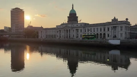 Custom House in Dublin at sunset with the River Liffey in the foreground Stock Footage 311769945