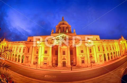 Custom house on the river liffey in dublin fish-eye at night. Stock Photos