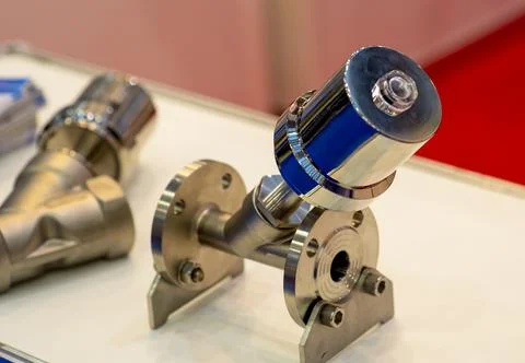 Custom-milled machine part made with CNC machine. Stock Photos