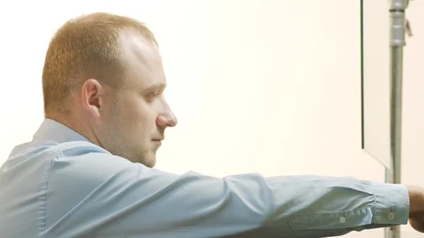 Custom officer checking and stamping a travelling passport Stock Footage 94088736