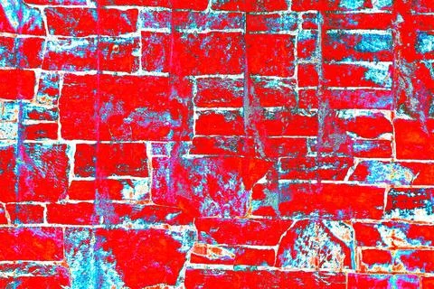 Custom stone wall on side of building. Vintage plaster texture. Changed col.. Ilustración de archivo